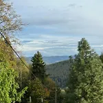 Osada Wichrowe Wzgórze Domek alpejski